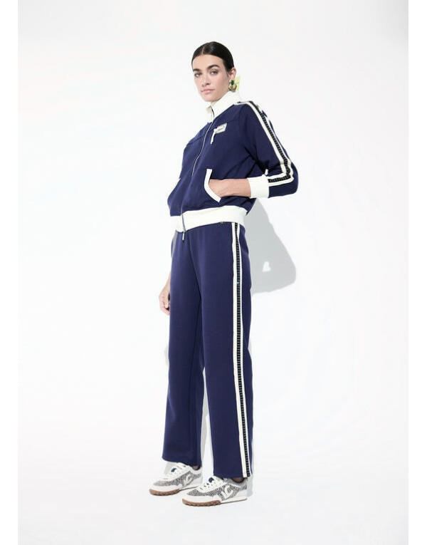 Pantalon jogger marine à bandes latérales et strass Lola Casademunt