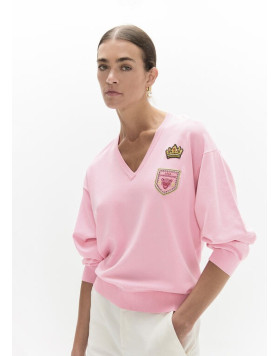 Pull col V rose à écussons Lola Casademunt